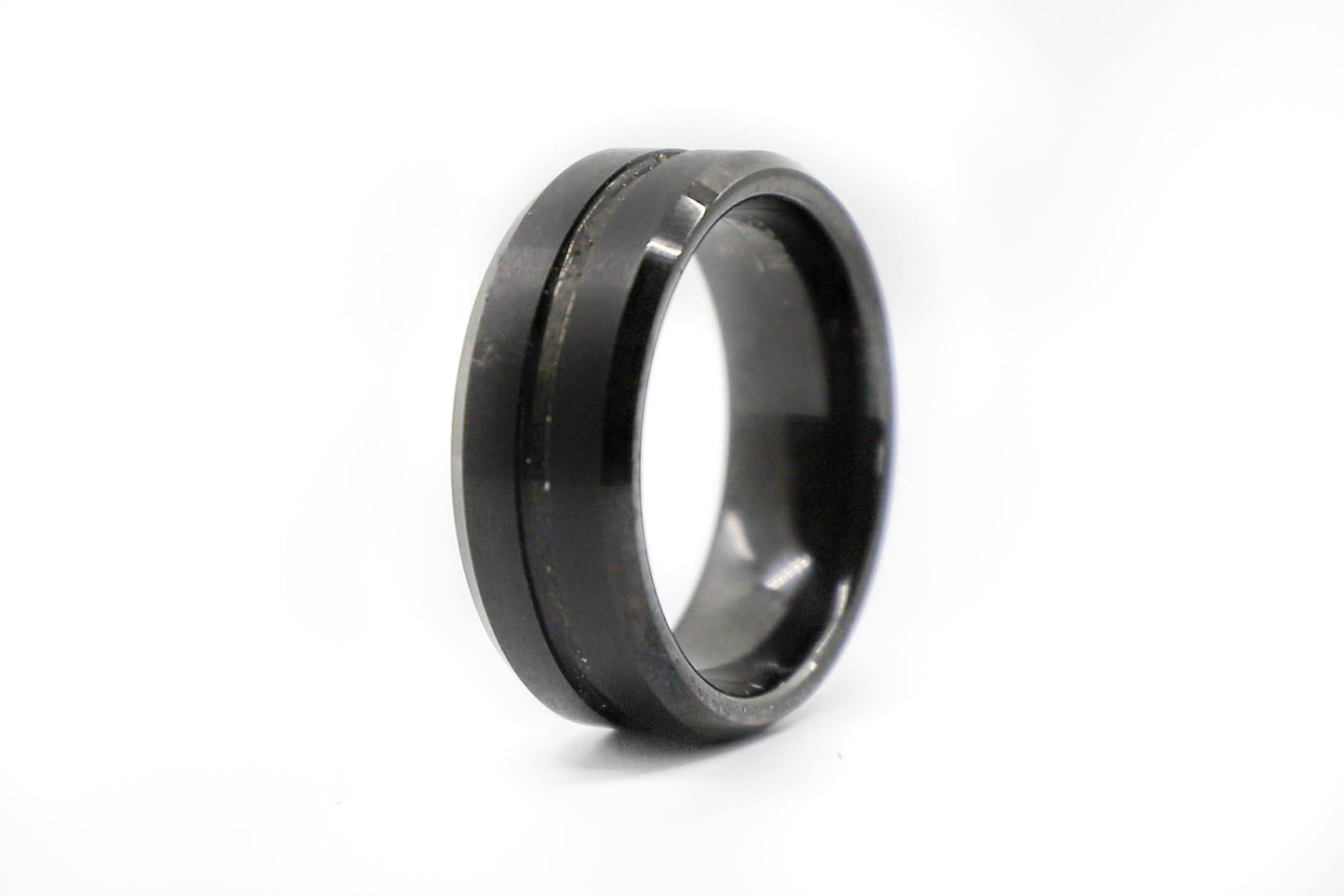solid black wedding ring with embossed stripe